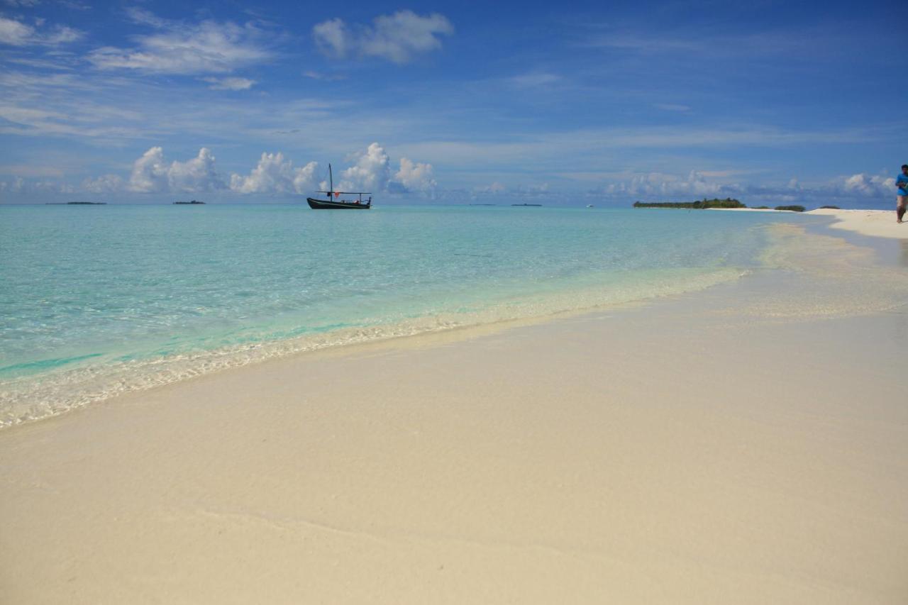 Dravida Hotel Maamigili Island Bagian luar foto